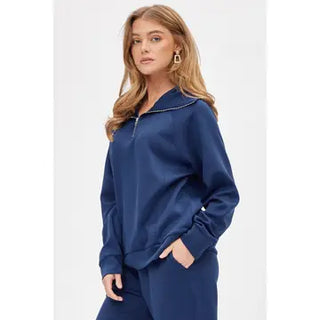 Woman wearing a blue outfit on a white background