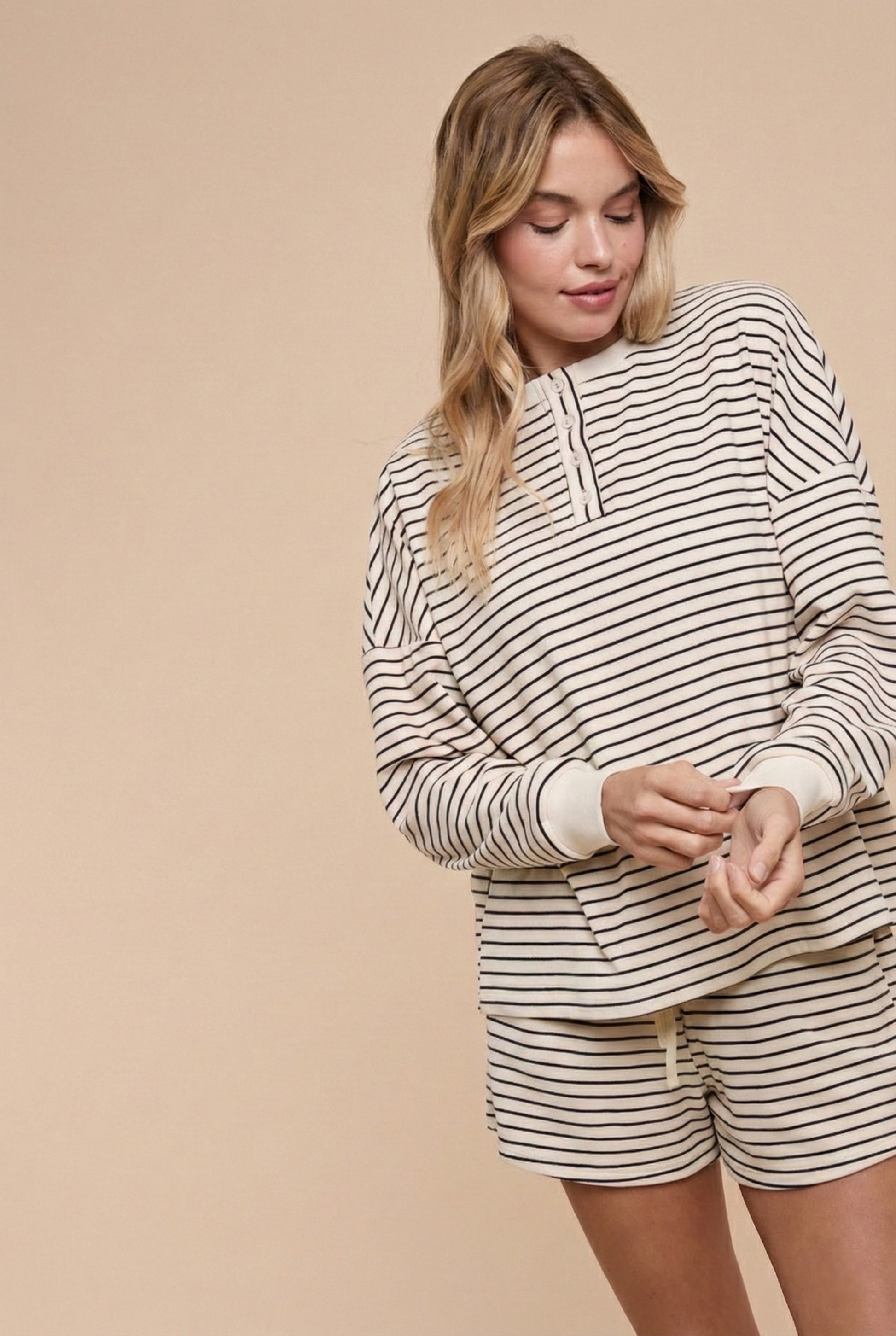 woman wearing a striped matching outfit 